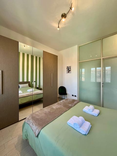 Bed, Photo of the whole room, Bedroom, towels, wardrobe