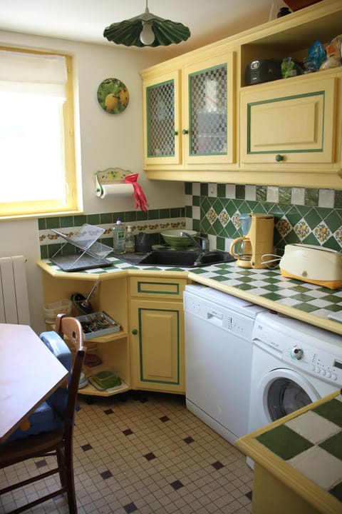 Kitchen or kitchenette, dishwasher, stove, washing machine, dryer