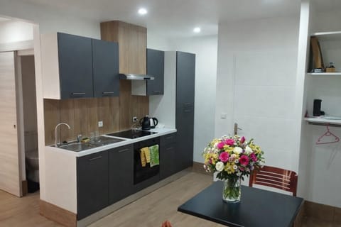 Kitchen or kitchenette, stove