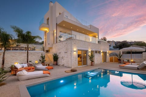 Property building, Patio, Seating area, Swimming pool, Sunset, sunbed