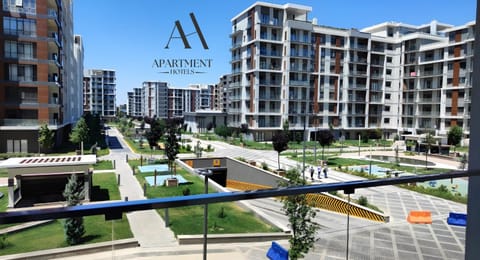 Property building, Day, Neighbourhood, Natural landscape, City view, Street view, Location, Parking