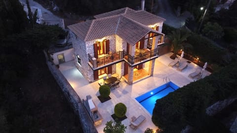 Property building, Night, Pool view, Swimming pool, sunbed