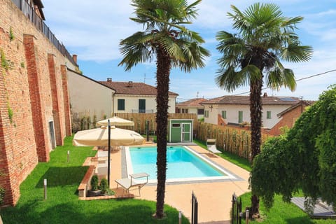 Property building, Patio, Garden, Garden view, Pool view, Swimming pool, sunbed