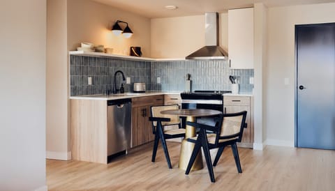 Dining area, dishwasher, oven, stove, kitchen