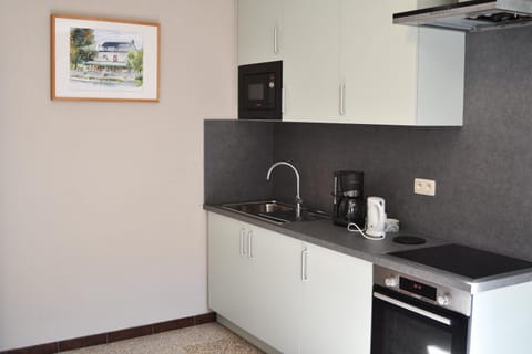 studio de lhotel à la ferme Apartment in Wallonia, Belgium