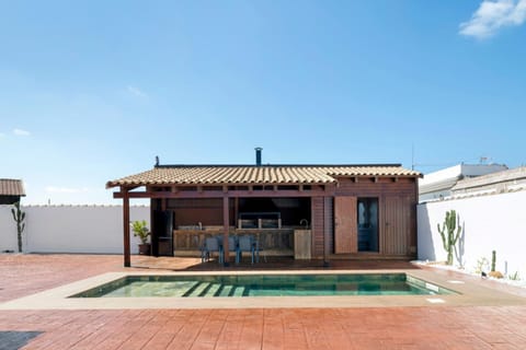 Property building, Living room, Swimming pool