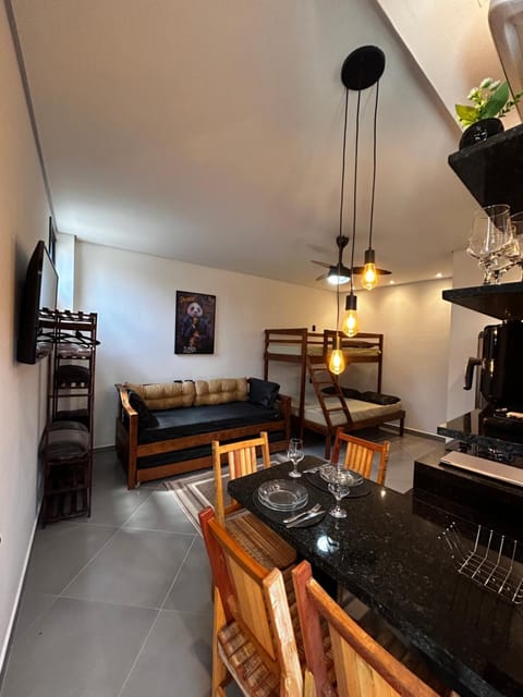 TV and multimedia, Kitchen or kitchenette, Living room, Seating area, Dining area, stove