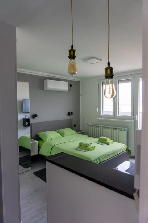Bed, Photo of the whole room, Bedroom, towels, air conditioner