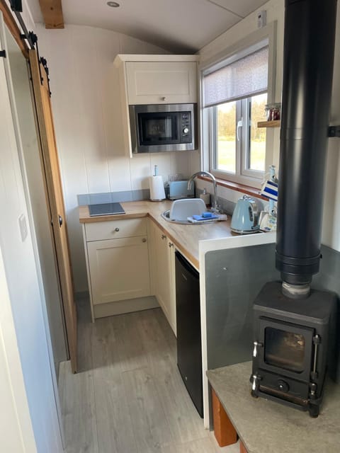 Kitchen or kitchenette, stove