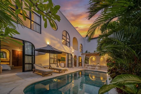 Property building, Patio, Pool view, Swimming pool, sunbed