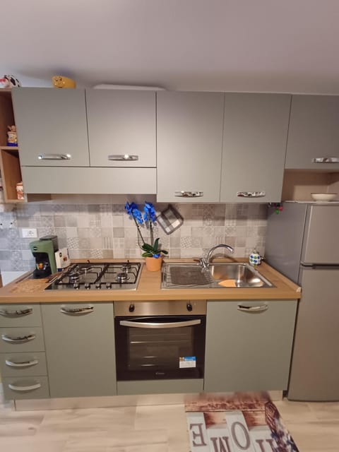 Kitchen or kitchenette, oven, stove