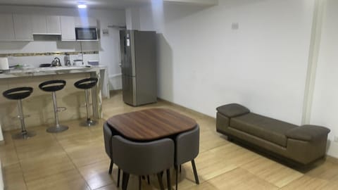 Kitchen or kitchenette, Living room, Seating area, Dining area