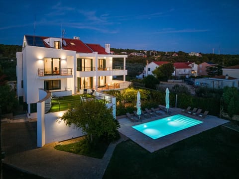 Property building, Night, Swimming pool