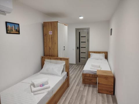 Bed, Photo of the whole room, towels, wardrobe, air conditioner