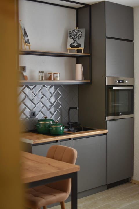 Kitchen or kitchenette, oven
