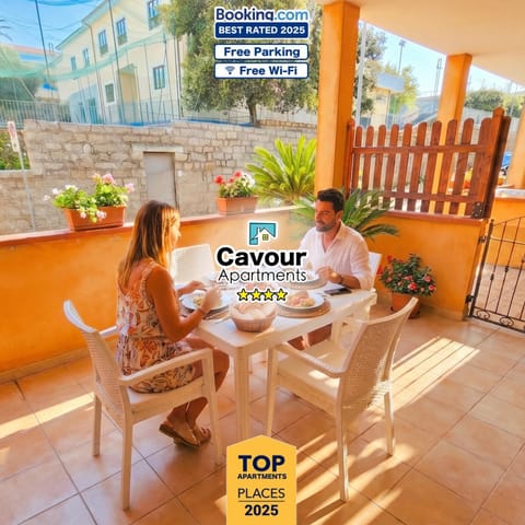Patio, Restaurant/places to eat, Day, People, Property logo or sign, View (from property/room), Balcony/Terrace, Food and drinks, Banquet/Function facilities, Dining area, Logo/Certificate/Sign, Food, Text overlay, Guests, group of guests, Certificate/Award
