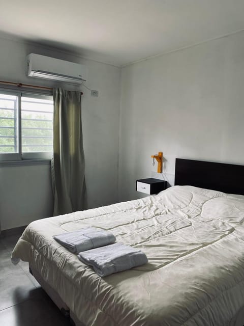 Bed, Photo of the whole room, Bedroom, towels, air conditioner