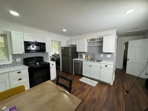 Kitchen or kitchenette, dishwasher, oven, stove, toaster