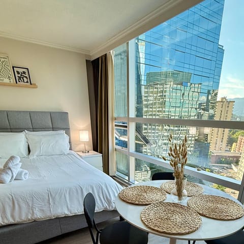 Bed, View (from property/room), City view, Mountain view