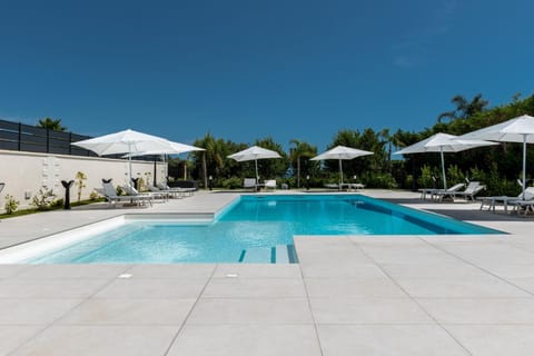 Property building, Living room, Swimming pool