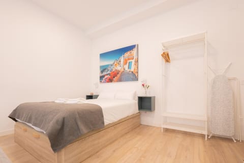 Bed, flat iron, wardrobe