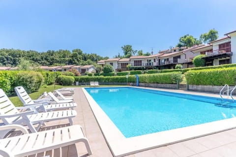Property building, Patio, Spring, Day, Swimming pool, sunbed