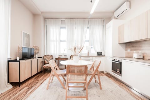 Dining area, oven, stove, air conditioner