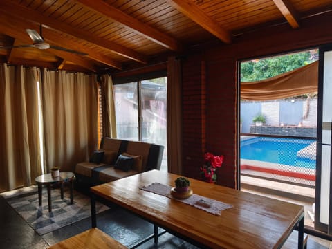 Living room, Dining area, Pool view