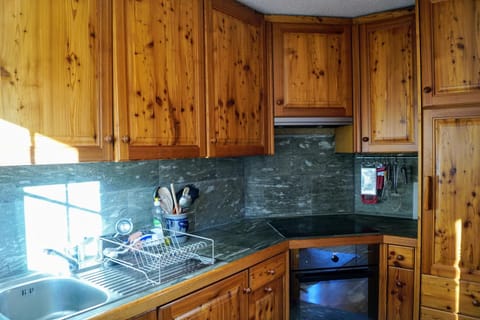 Kitchen or kitchenette, oven, stove