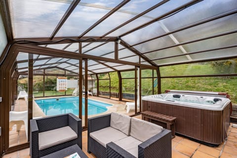 Property building, Living room, Swimming pool