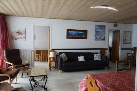 Bed, fireplace, kitchen