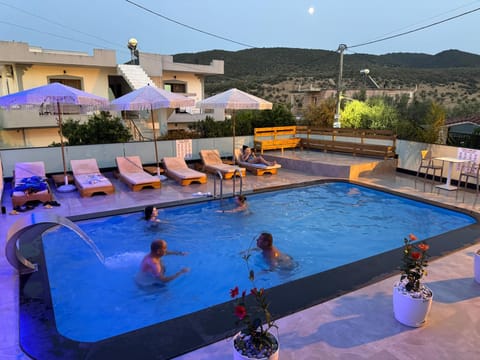 Property building, Patio, Day, Natural landscape, Mountain view, Pool view, Swimming pool, sunbed