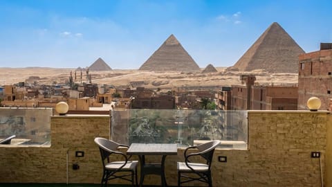 Property building, Patio, Nearby landmark, Day, Natural landscape, View (from property/room), Balcony/Terrace, City view, Mountain view