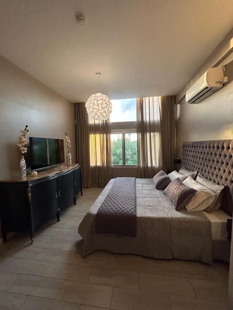 Bed, air conditioner