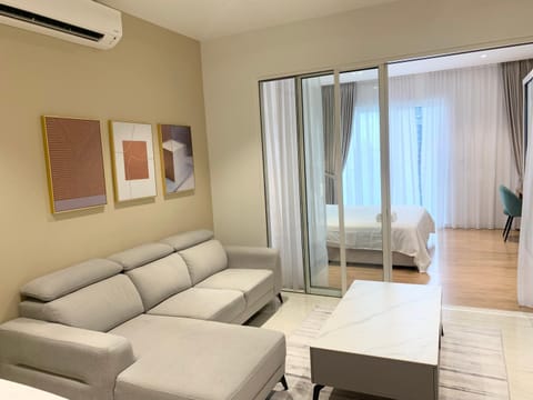 Bed, Living room, Seating area, Bedroom