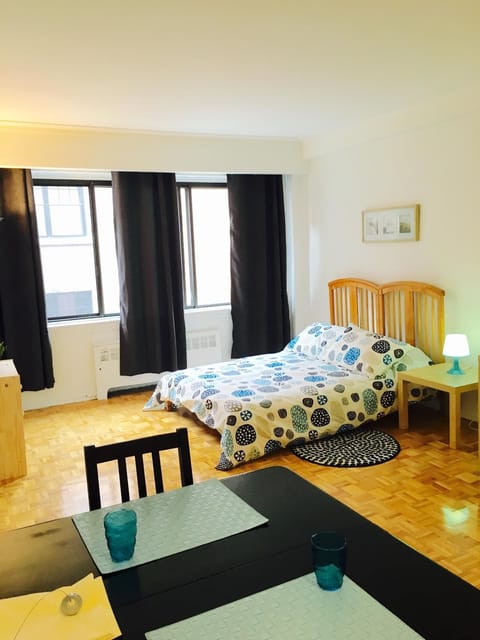 Bed, Living room, Seating area, Bedroom