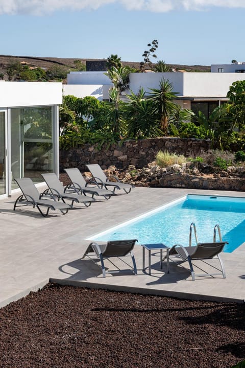Patio, Off site, Natural landscape, Pool view, Swimming pool, sunbed