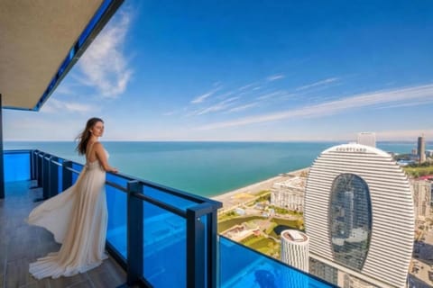 Nearby landmark, Day, People, Natural landscape, View (from property/room), Balcony/Terrace, Pool view, Sea view, Swimming pool, group of guests