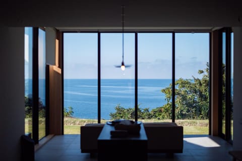 Day, Natural landscape, Living room, Seating area, Dining area, Sea view