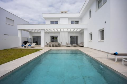 Property building, Living room, Swimming pool