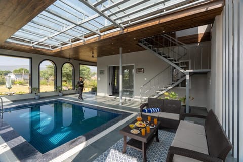 Patio, View (from property/room), Balcony/Terrace, Living room, Seating area, Pool view, Swimming pool, sunbed