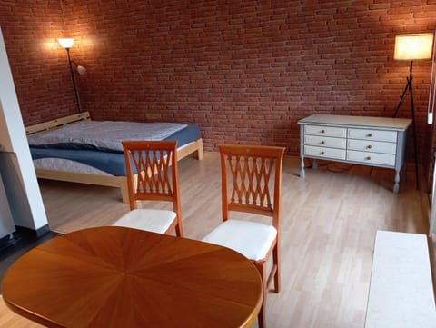 Bed, Living room, Seating area, Bedroom
