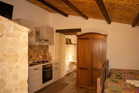 Kitchen or kitchenette, Seating area, oven, stove, towels, wardrobe, kitchen