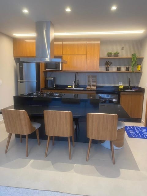 Kitchen or kitchenette, minibar, oven, stove, toaster