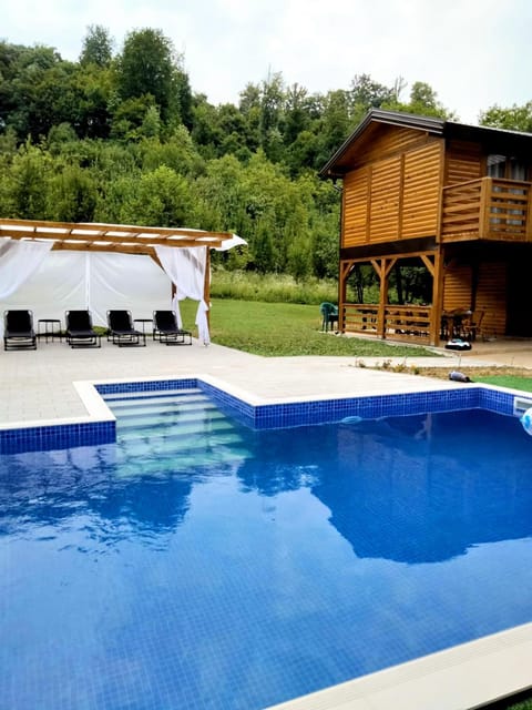 Property building, Pool view, Swimming pool, sunbed
