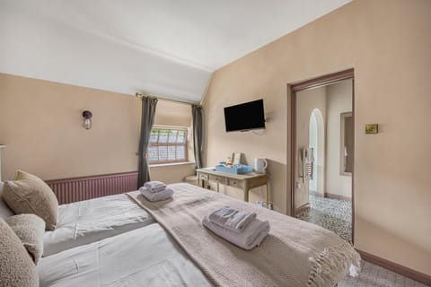 The Golden Pheasant Inn Hotel in West Oxfordshire District