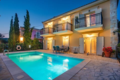 Property building, Patio, Night, Pool view, Swimming pool, sunbed