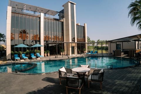Property building, Patio, Swimming pool, Swimming pool, sunbed