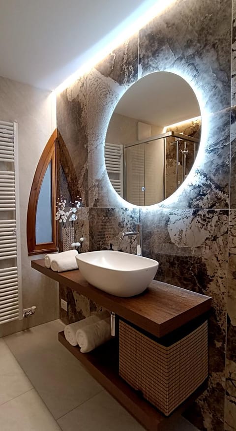 Toilet, Bathroom, hair dryier, towels