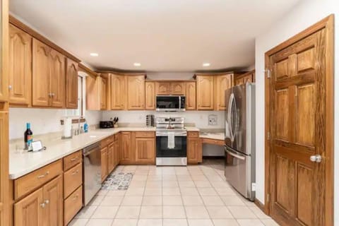 Kitchen or kitchenette, dishwasher, oven, stove, toaster